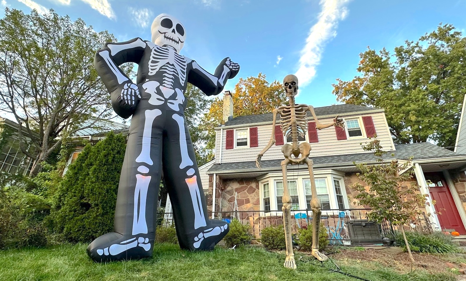 Lowe&#039;s 20-foot inflatable skeleton vs. Home Depot 12-foot skeleton