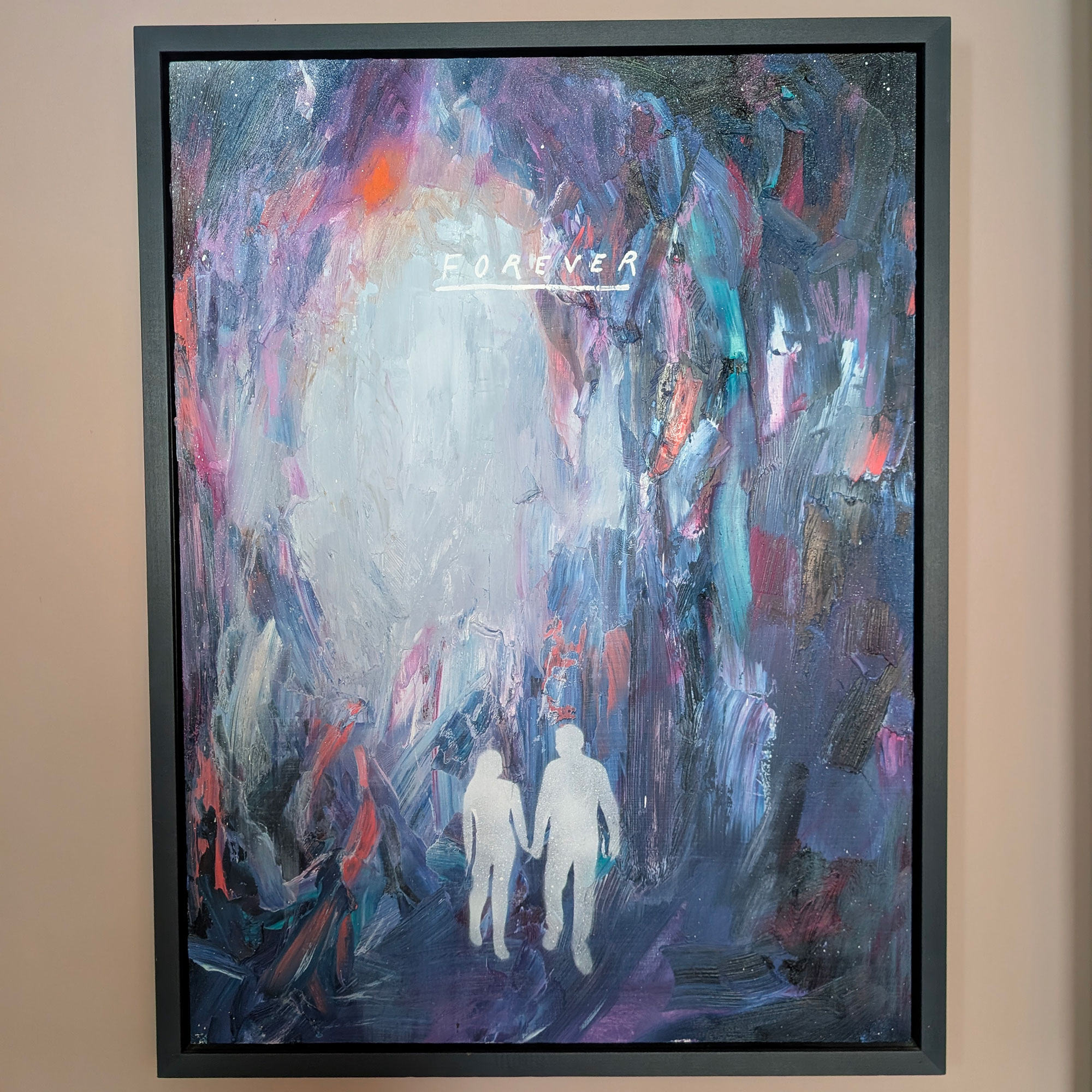 Abstract artwork framed and hung on wall