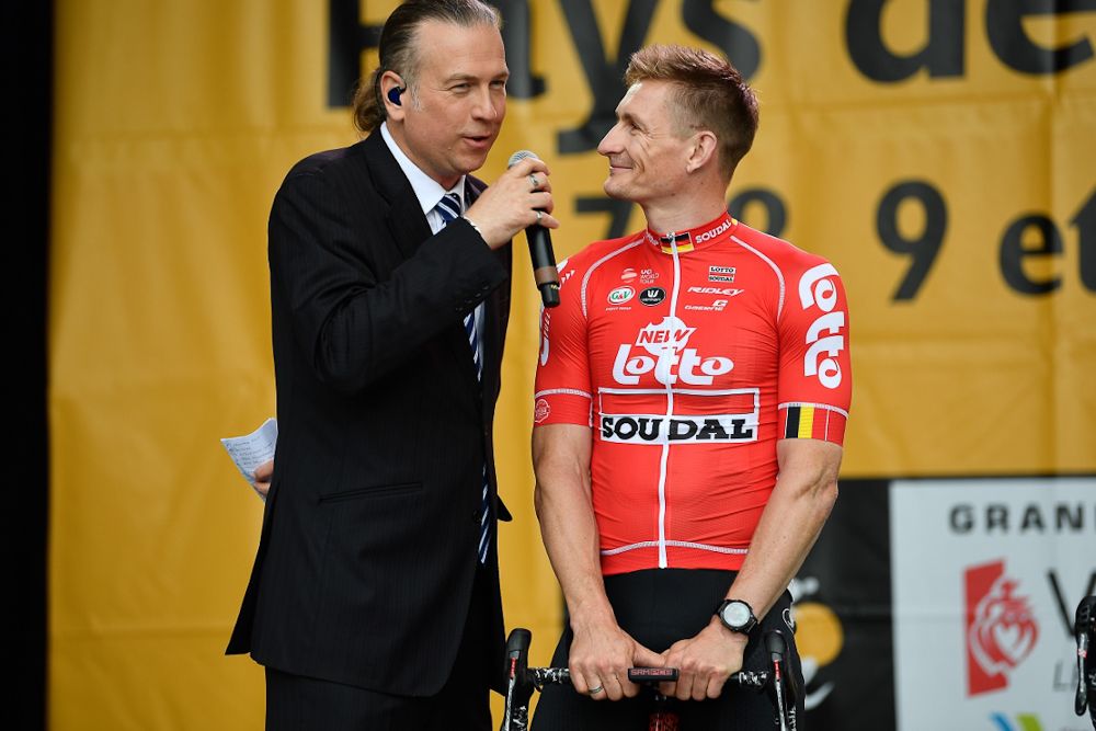 Andre Greipel chats on stage at the 2018 Tour de France team presentation