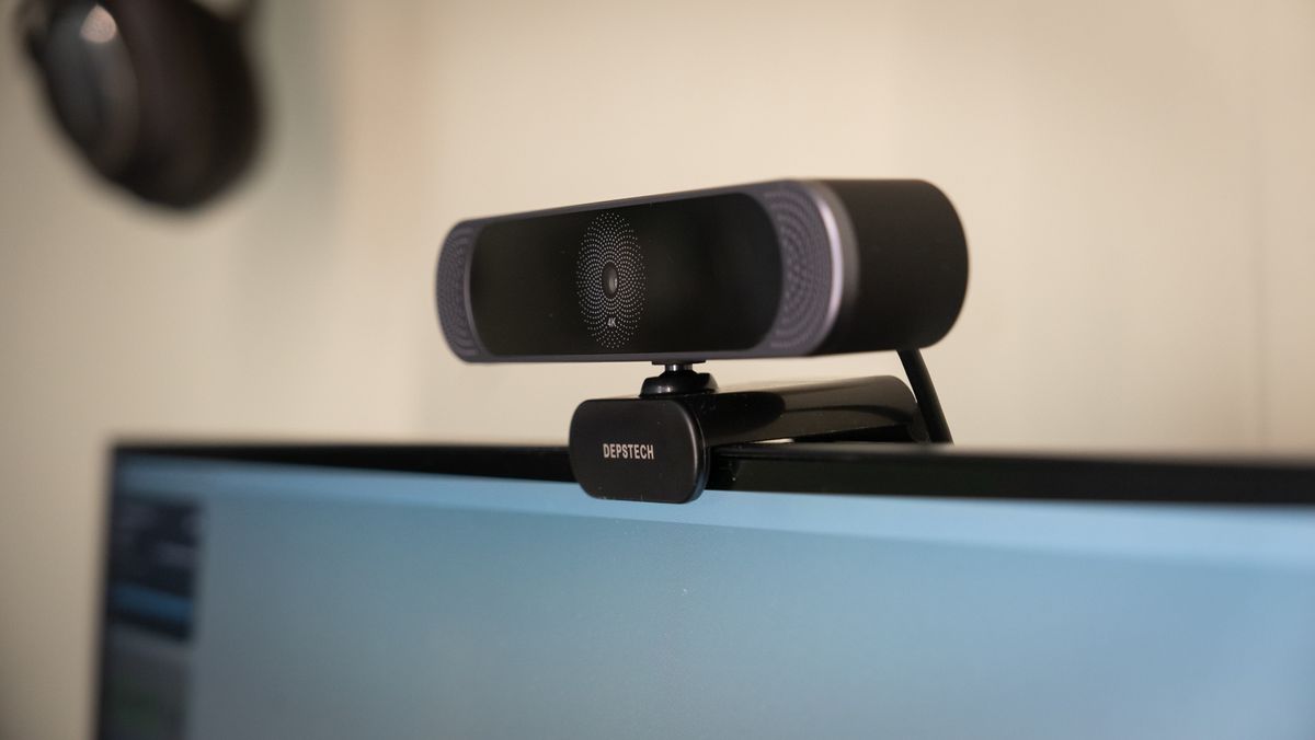 Depstech DW49 Pro 4K webcam mounted on top of a PC monitor