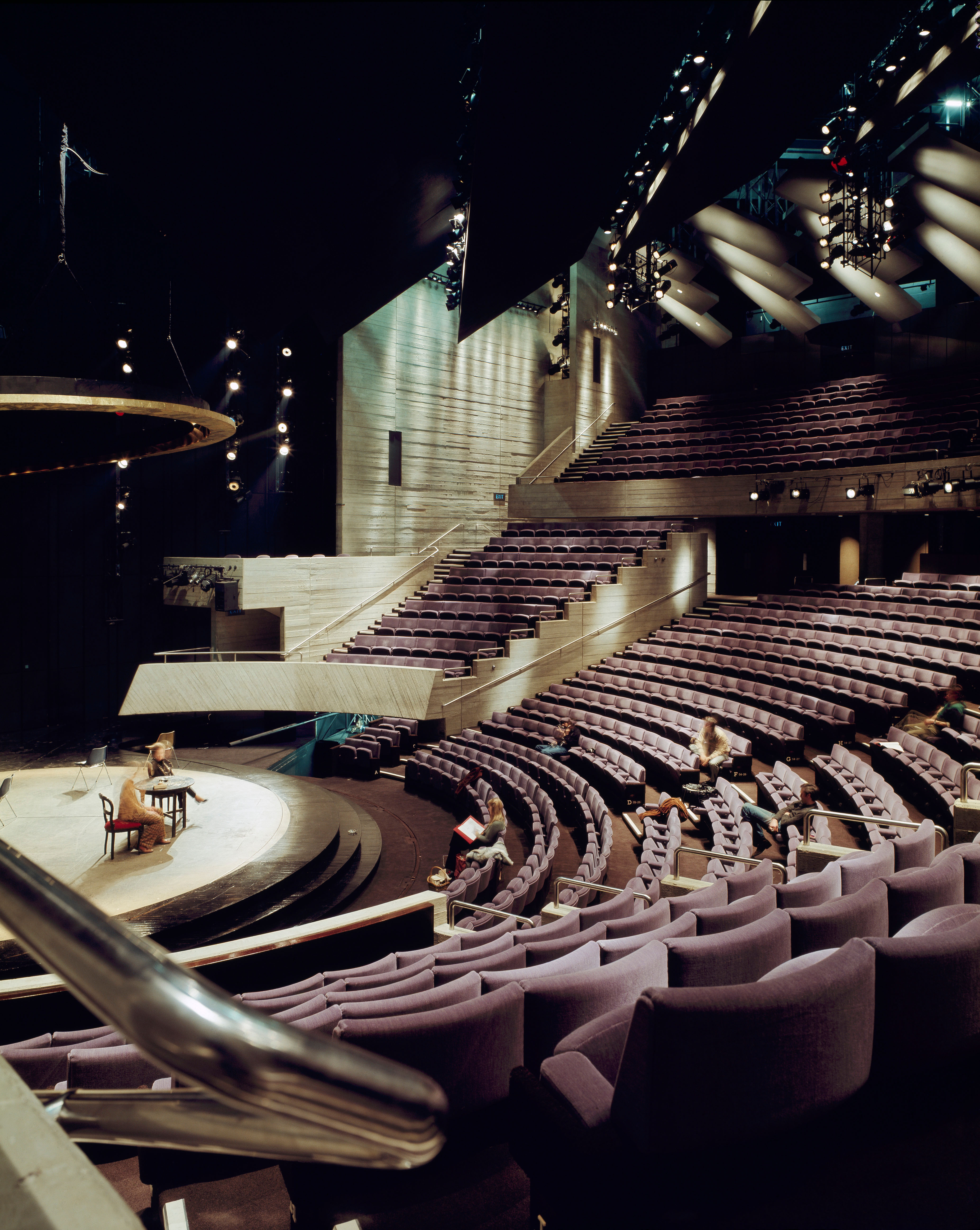 The Olivier Theatre, inside the National Theatre, designed by Ladsun. The ampitheatre-style space features seating in the shape of a fan