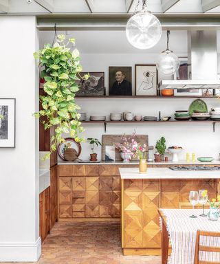 Cozy kitchen with wood island and open shelving