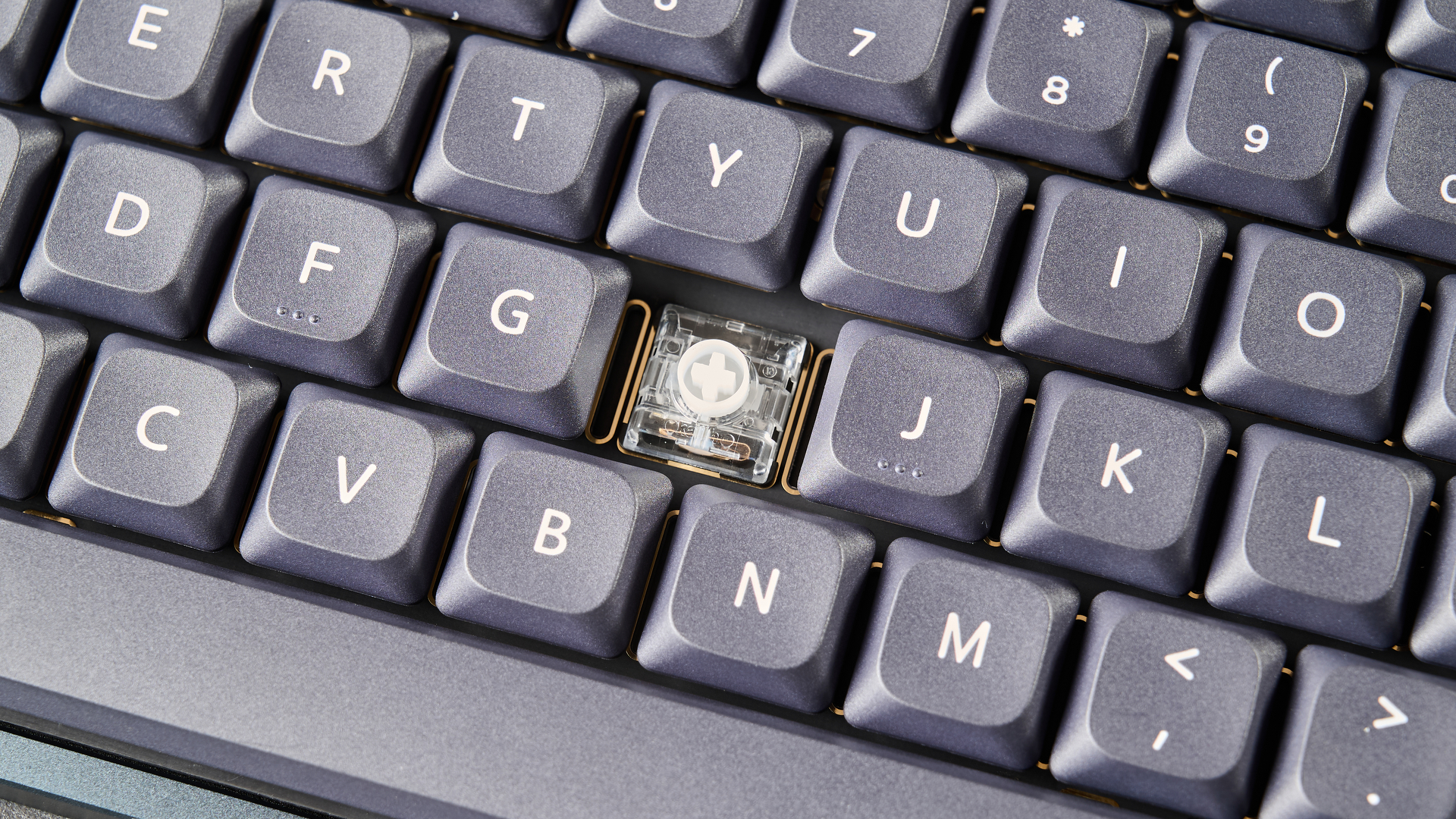 A black Iqunix Magi75 mechanical keyboard