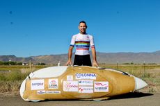 François Pervis in a rainbow jersey with his recumbent bike