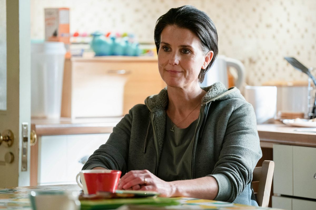 Eve Unwin sitting at a table