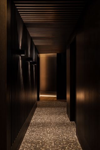 moody dark corridor inside capella sydney