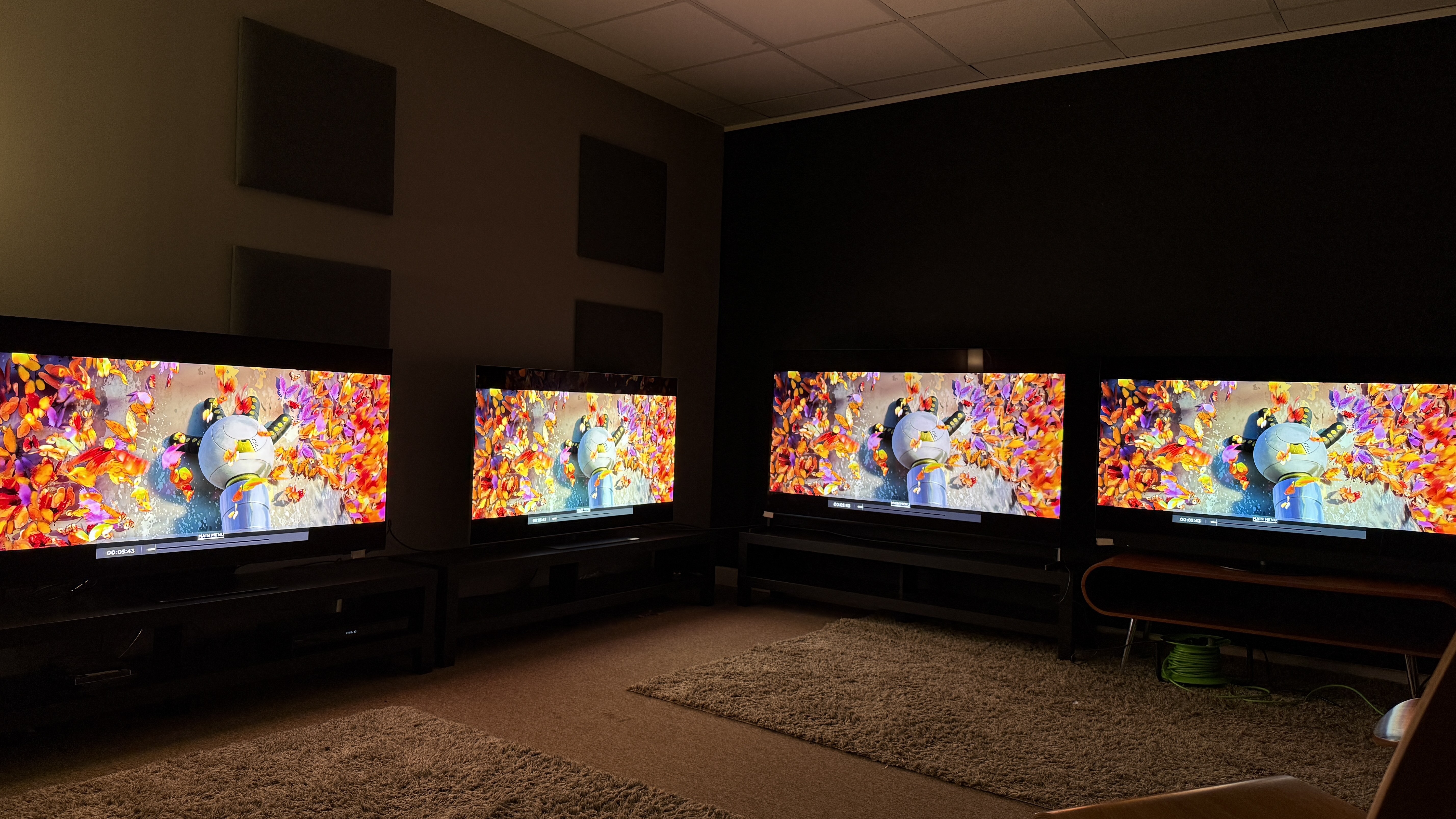 Samsung S95F (far left) LG G5 (middle left) Sony Bravia 8 II (middle right) Panasonic Z95B (far right) OLED TVs all displaying The Wild Robot butterfly scene