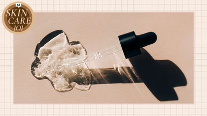 From above closeup pipette placed on beige background and spilling transparent serum
