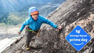 A mountain climber wearing a blue Patagonia Nano Puff on a rock face