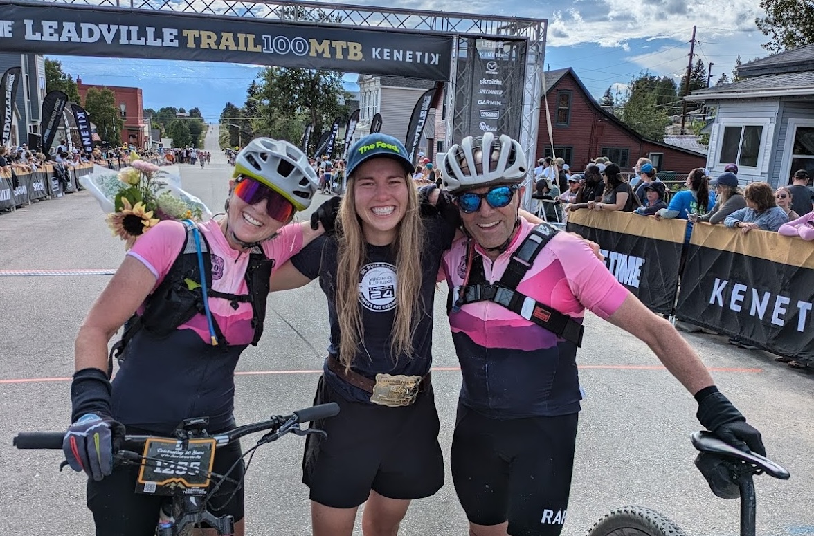 Melisa Rollins with parents Lisa Nelson and stepfather Elden at finish line of 2024 Leadville Trail 100 MTB