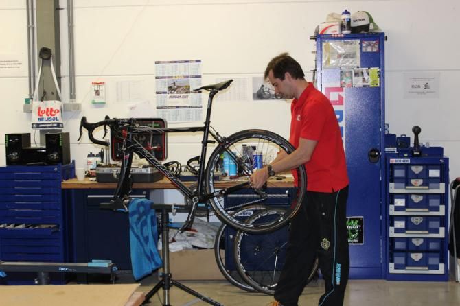 Mechanic sets up the bikes for the Tour of Flanders