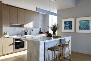 Modern kitchen with sleek kitchen island lighting