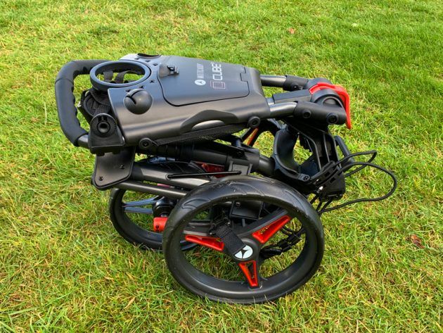 Motocaddy Cube Push Cart, motocaddy cart folded up on grass