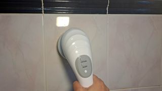 Electric scrubber to clean bathroom tile