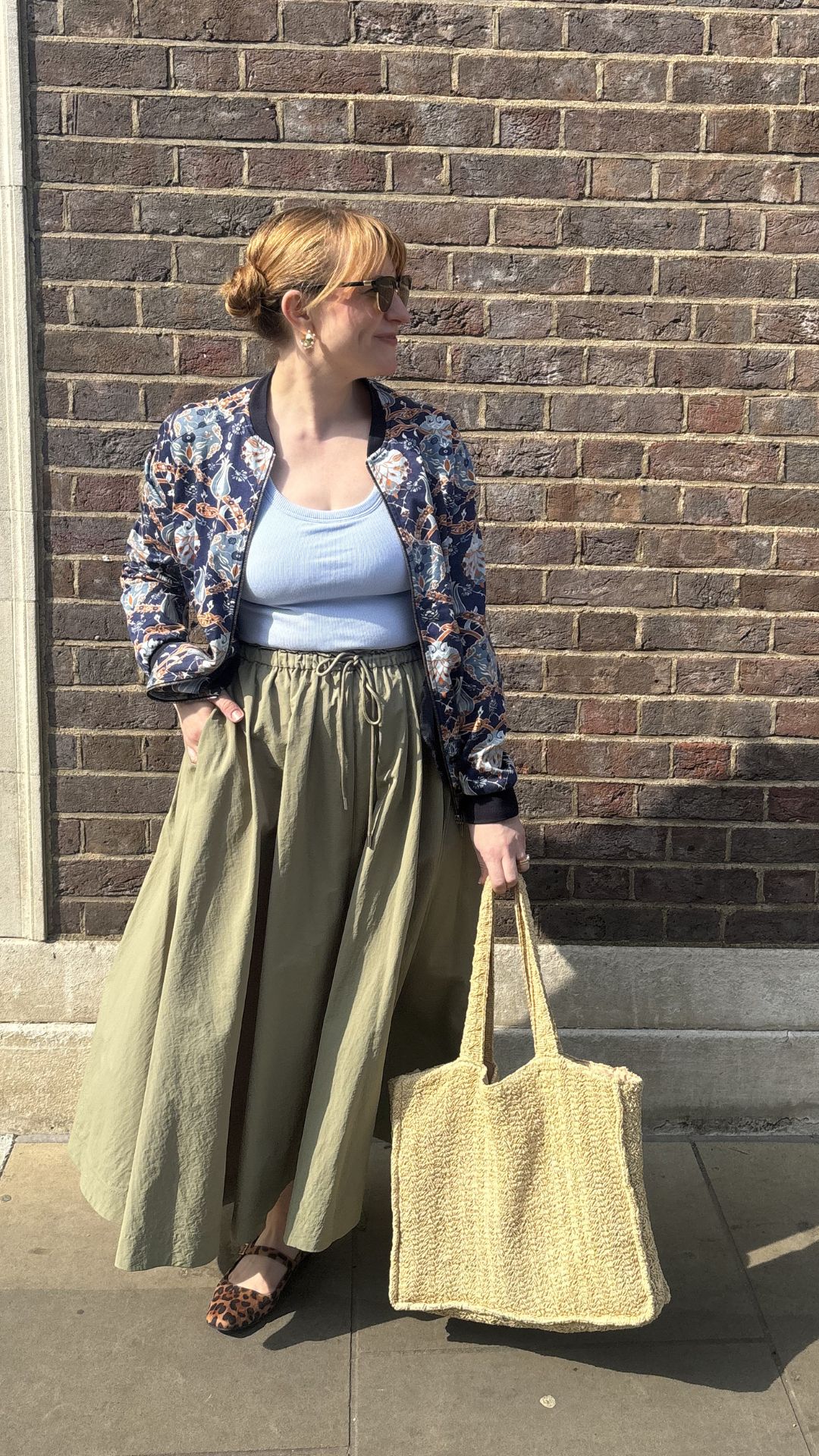 matilda wearing the tu khaki midi skirt