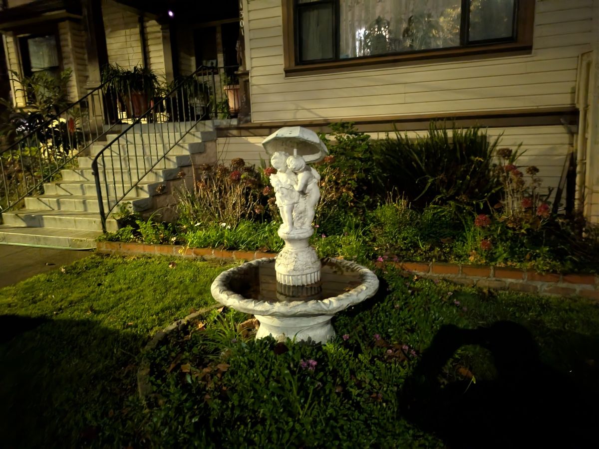 Fountain at night shot by Pixel 8a