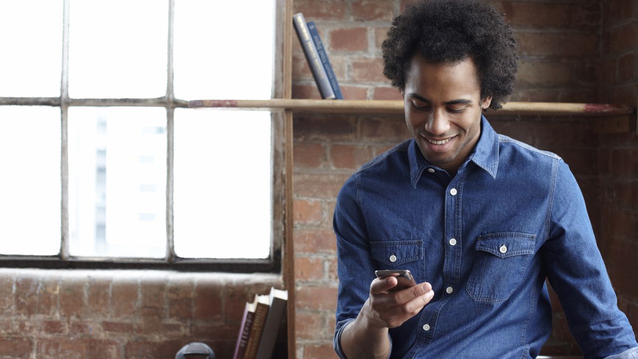 young adult with phone