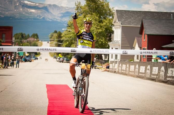Alban Lakata (Topeak Ergon) takes the win after shattering the previous record by over12 minutes.