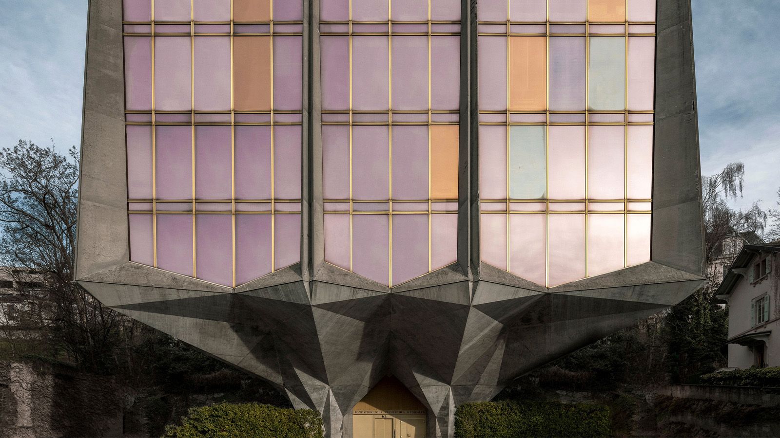 brutalist concrete and glass building