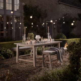 festoon light ideas: cox & cox festoon lights around outside table