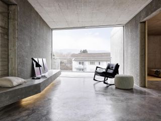 Inside view looking out to the exterior of concrete apartment building in Zurich