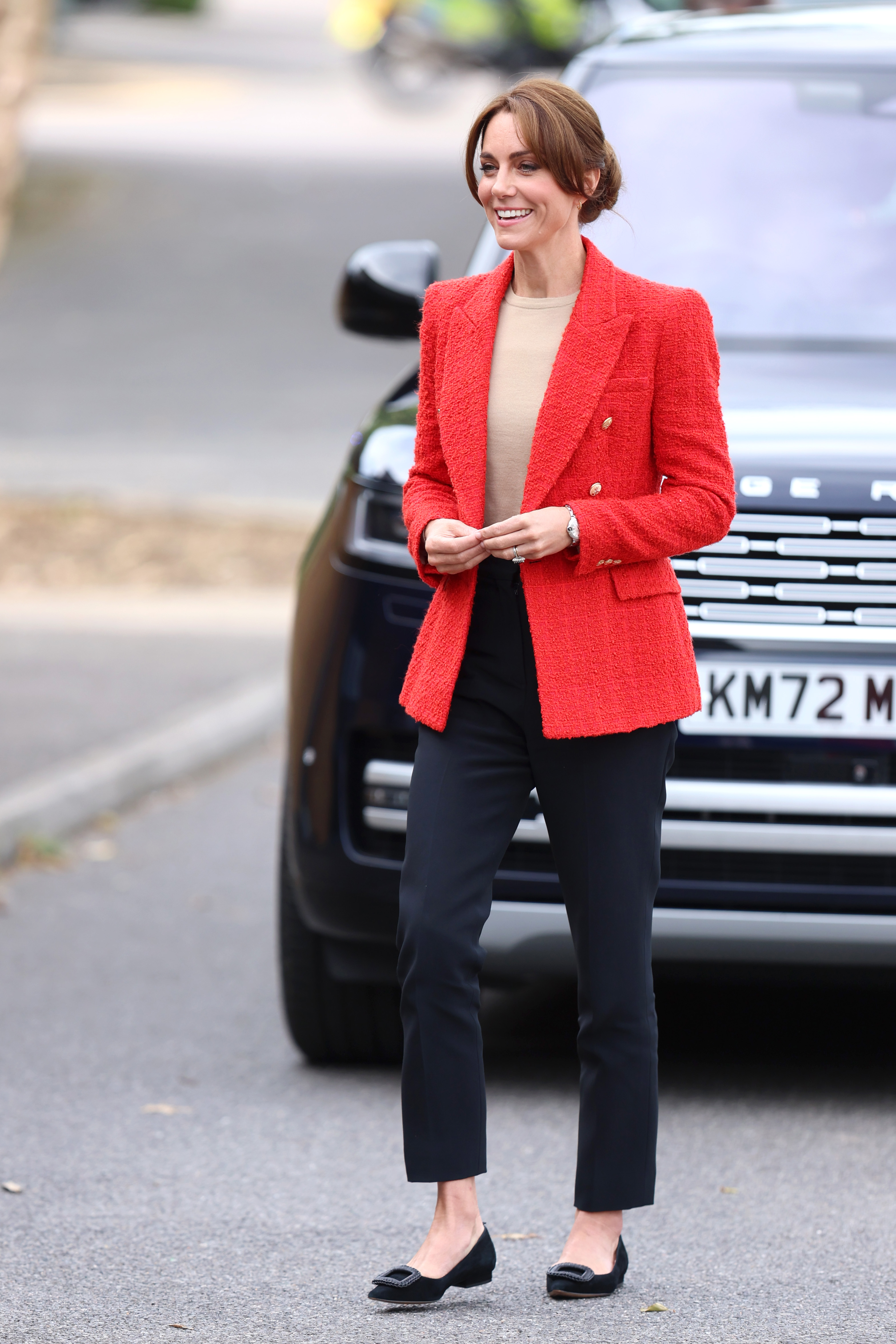Princess Kate wearing a red blazer
