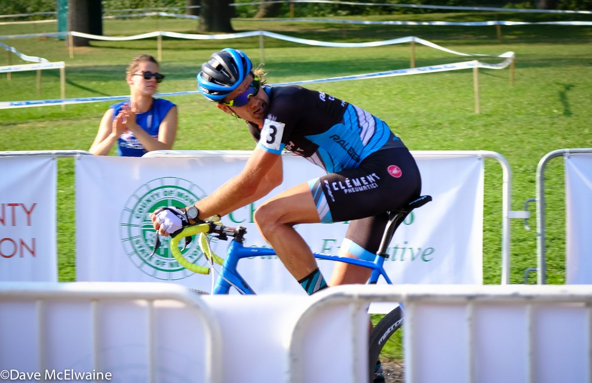 With one lap to go Jamey Driscoll (Raleigh Clement) checks to see how close Powers was
