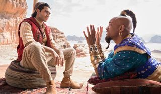 Aladdin and Genie talk in the desert in Aladdin (2019)