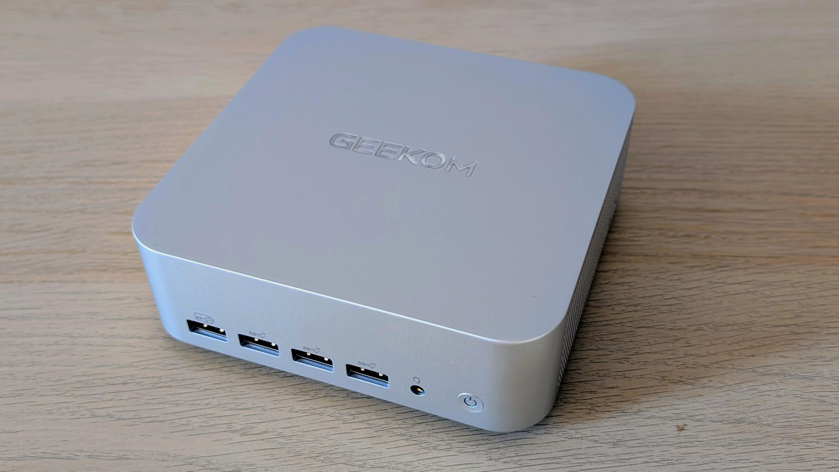 The Geekom A7 Max on a desk