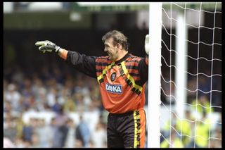 Everton goalkeeper Neville Southall gives instructions to his defenders in a game against Newcastle in August 1996.