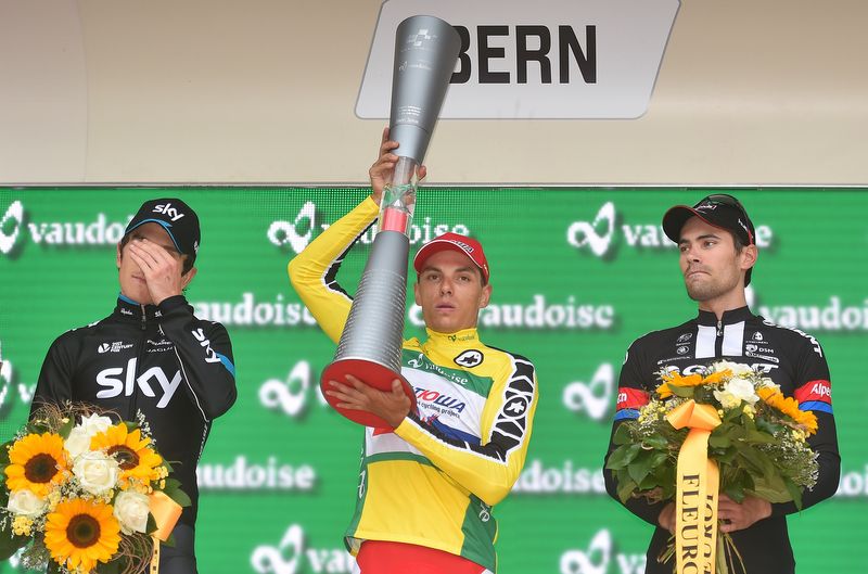 Simon &Scaron;pilak (Katusha) holds his winners trophy aloft