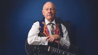 Robert Fripp photographed with his 1959 Gibson Les Paul Custom, the guitar behind much of his early groundbreaking work, in 2022. 