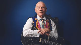 Robert Fripp photographed with his 1959 Gibson Les Paul Custom, the guitar behind much of his early groundbreaking work, in 2022.