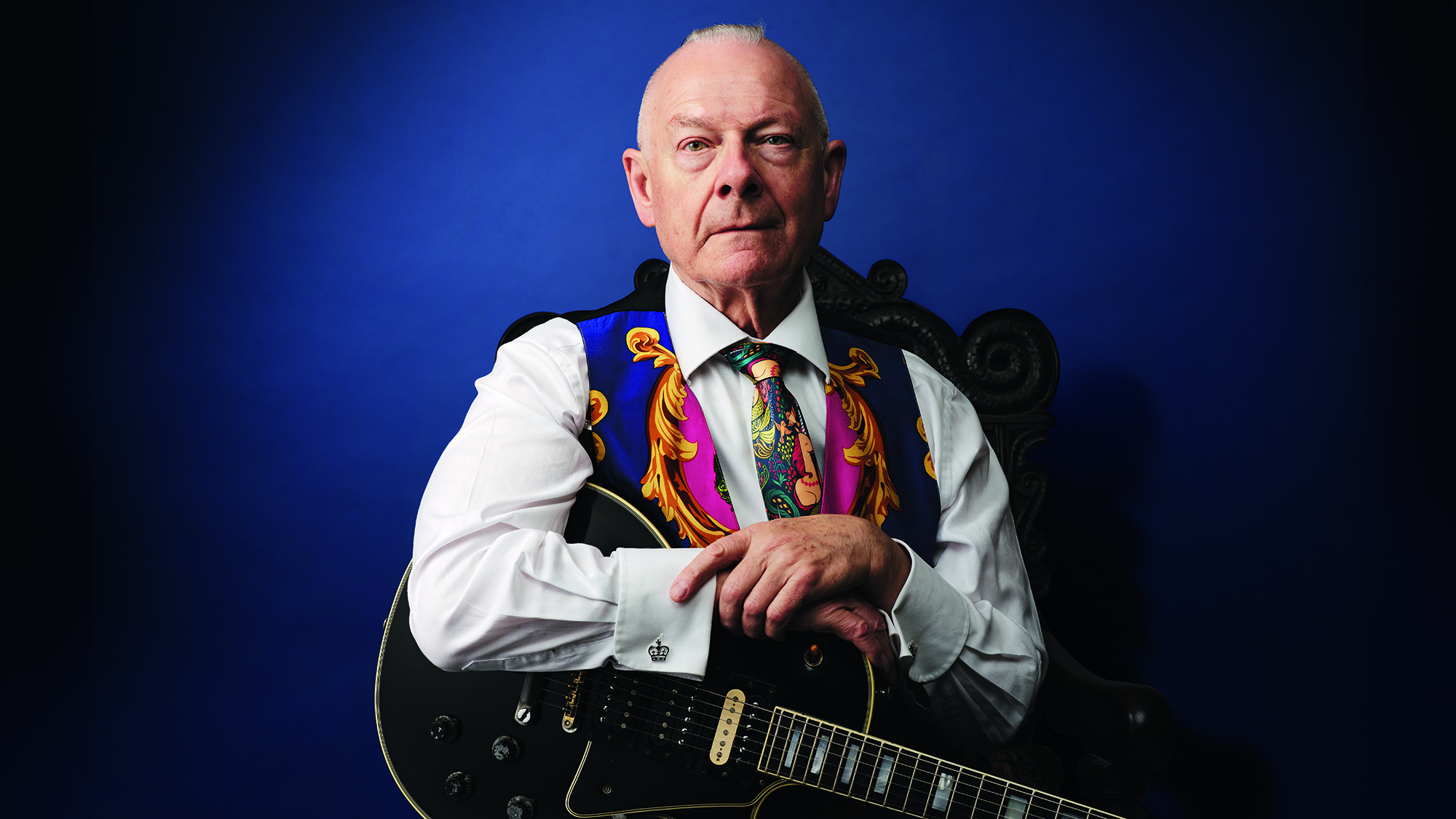 Robert Fripp photographed with his 1959 Gibson Les Paul Custom, the guitar behind much of his early groundbreaking work, in 2022. 