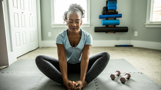 Woman preparing to exercise at home