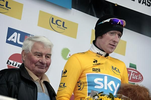 Overall leader Bradley Wiggins (Sky) on the podium with French great Raymond Poulidor, a two-time Paris-Nice champion.
