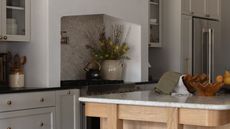 gray kitchen in farrow and ball skimming stone with timber island and marble countertop