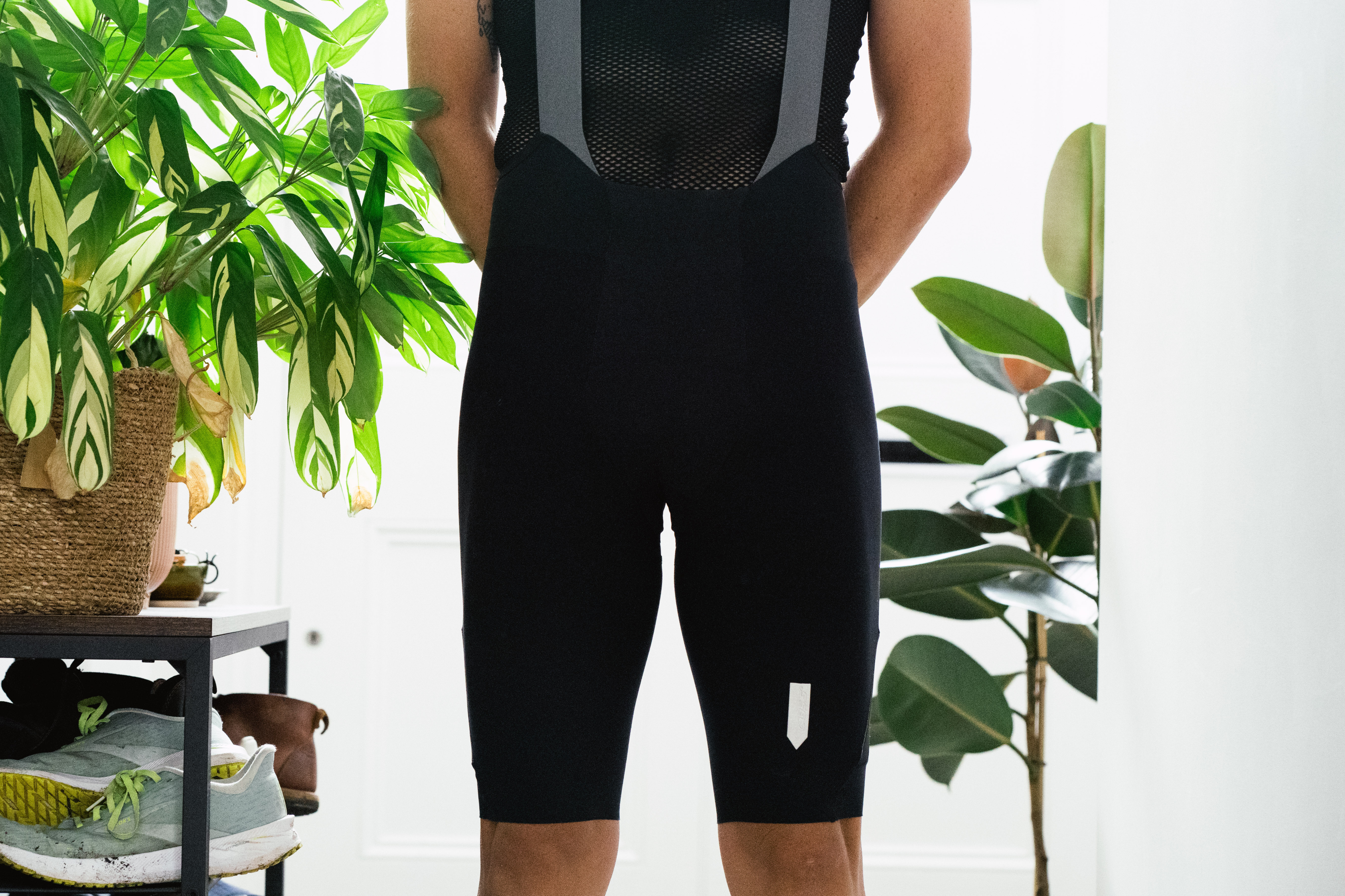 Q36.5 Dottore Hybrid bib being worn with some plants in the background