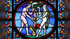 stained glass window of Adam and Eve