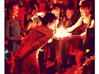 Alexa Chung blows out her candles and celebrates her 30th birthday with friends