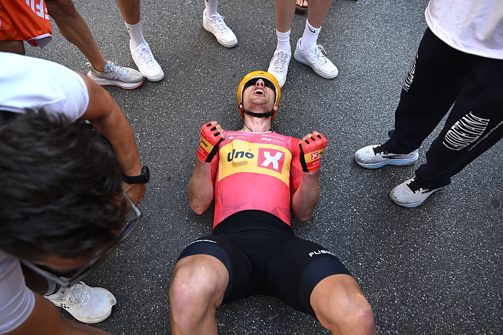 2026 Giro d'Italia stage 15: an exhausted Fredrik Dversnes celebrates the win
