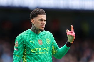Manchester City goalkeeper Ederson in action against Luton in April 2024.