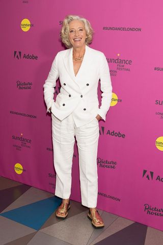 Emma Thompson wearing a white suit