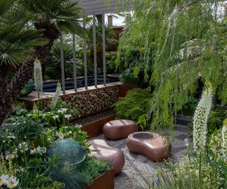 hot tub in garden designed by Kate Gould