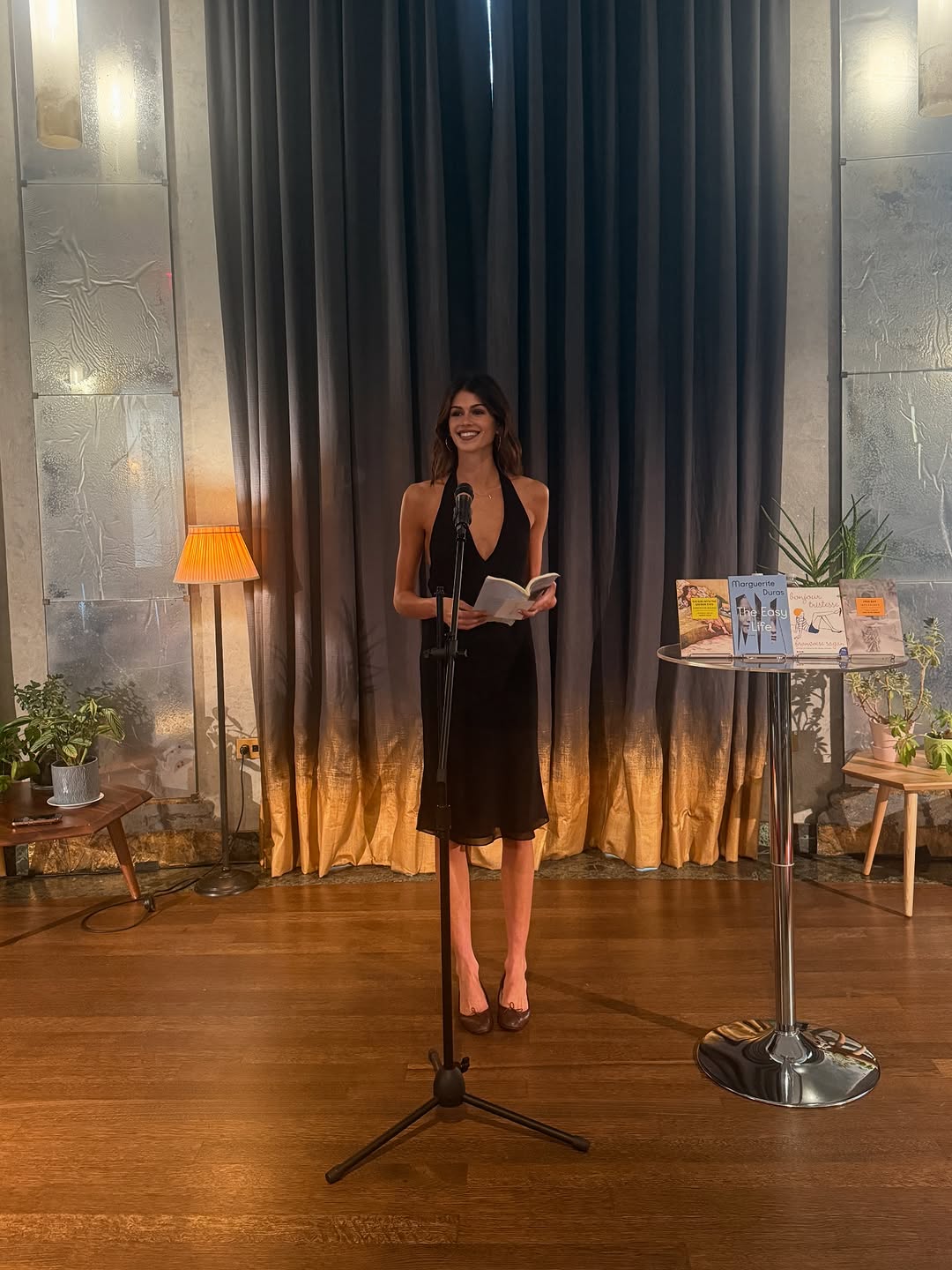 Kaia Gerber hosted a Library Science event in a halter LBD and brown ballet flats
