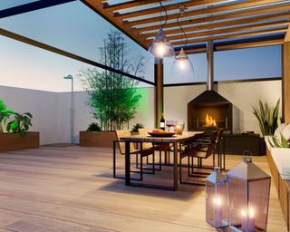 modern urban garden with pergola and fireplace