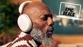 best headphone deals mature bearded black man wearing Sonos Ace white over-ear headphones 