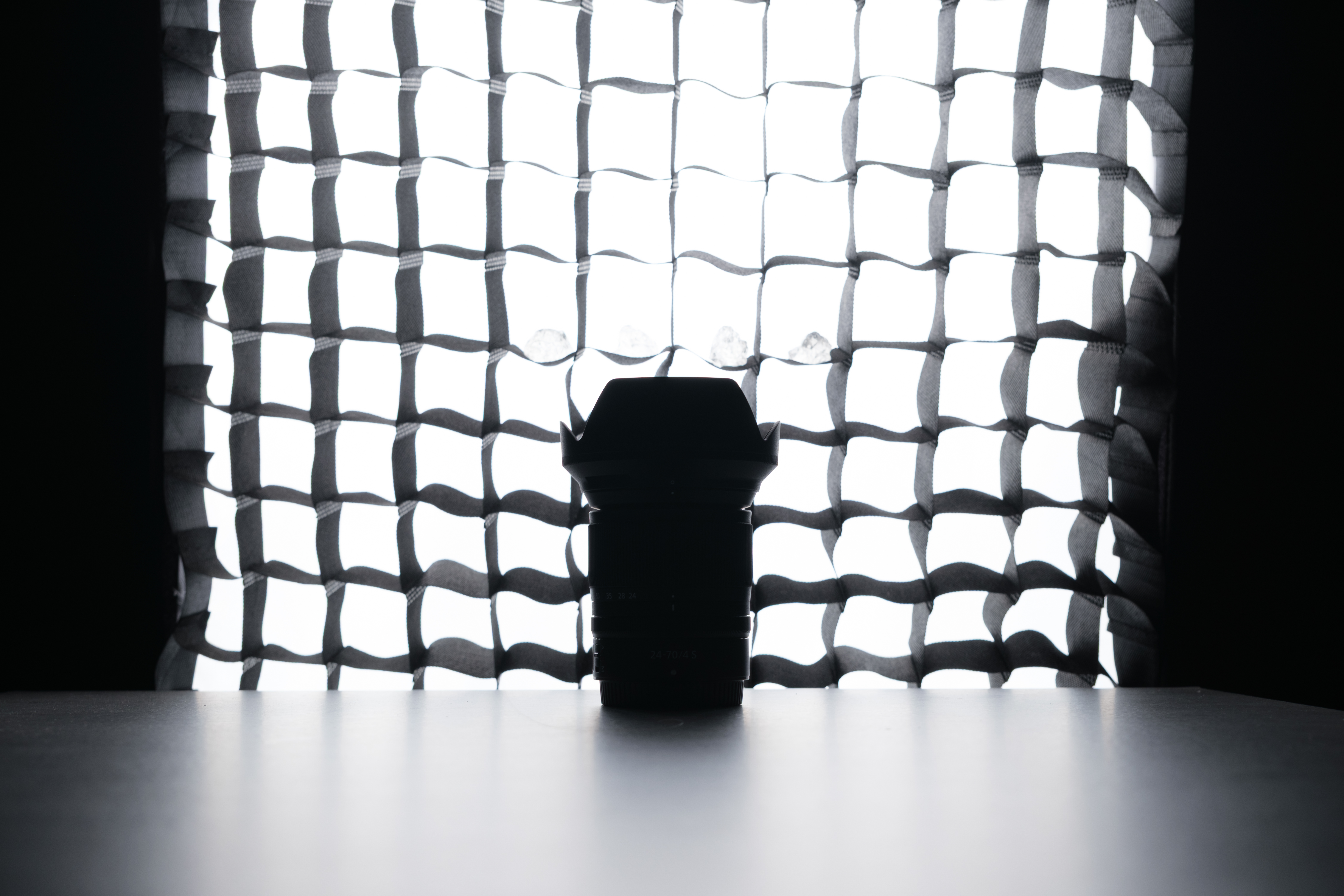 A backlit photo of a lens taken on the Fujifilm X-T30 III