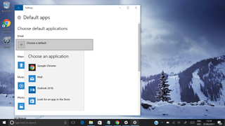 A screenshot of the Windows 10 desktop showing a menu allowing users to set default apps