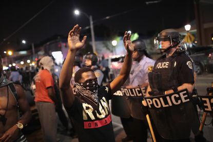 Protesters clash with police in St. Louis